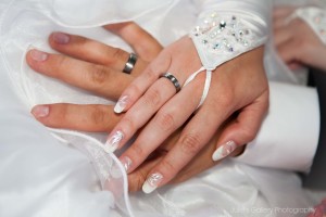 hands-with-wedding-rings